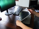 This is how a normal computer becomes an electronic exercise book: Turn the screen carefully and fold it onto the keyboard. A special pen is used for the writing. And of course we supply an additional keyboard. 